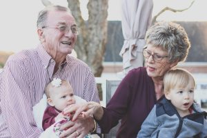 grandparents and grandchildren smiling