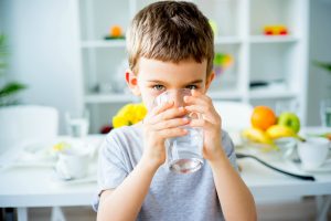 boy drinking water