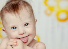 down syndrome baby smiling