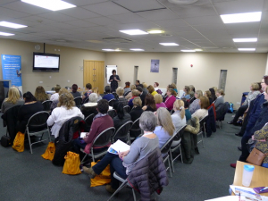 seminar room with lots of people at bladder and bowel symposium