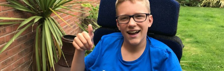 ben sat in his garden with his thumb up