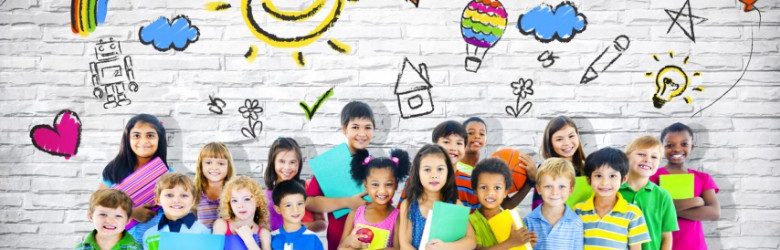 group of children smiling wearing colourful clothes