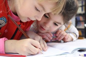 close up of children learning in the classroom