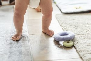 close up of baby legs taking steps