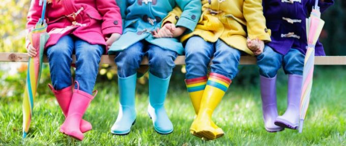group of kids wearing wellies
