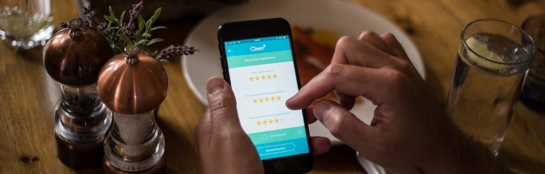 cleen app on mobile phone in hand