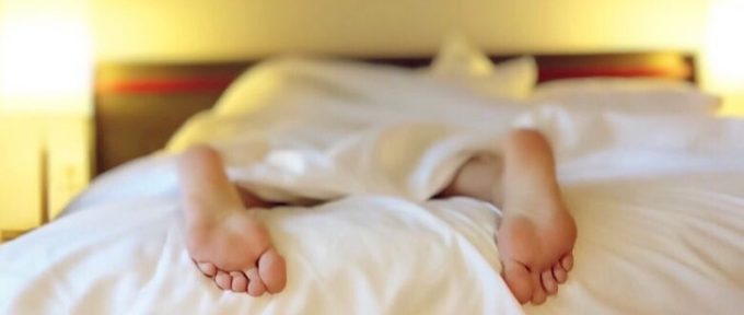 nocturia featured image with feet handing out of bed