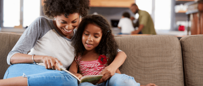 mother teaching child about bedwetting
