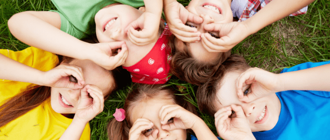 close up of children's smiling faces