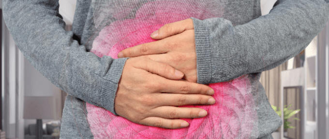 woman holding her stomach