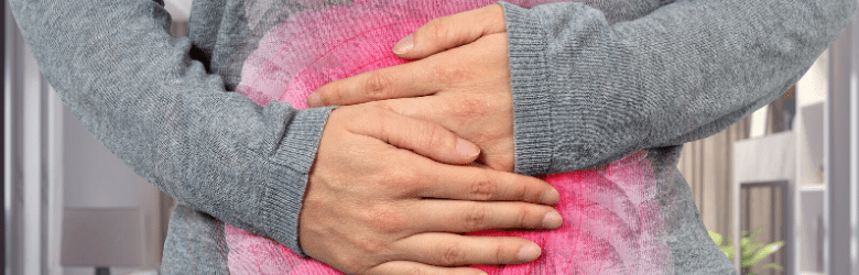 woman holding her stomach