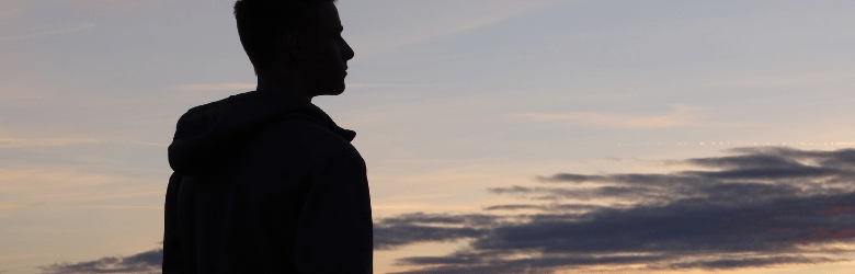 teenager against sunset