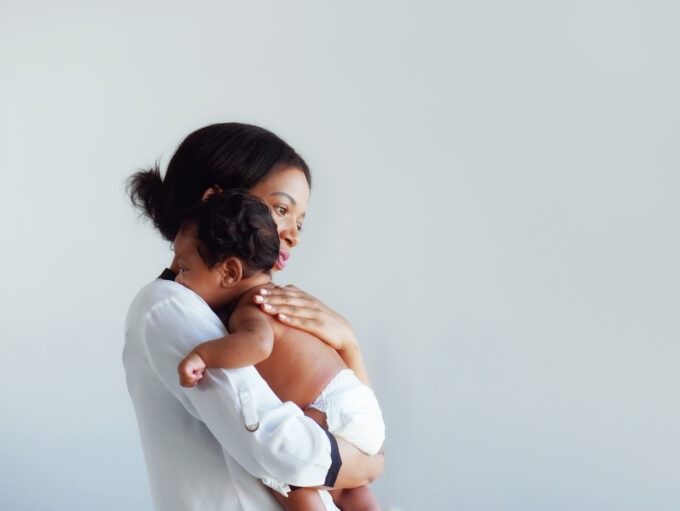 Mum comforting baby
