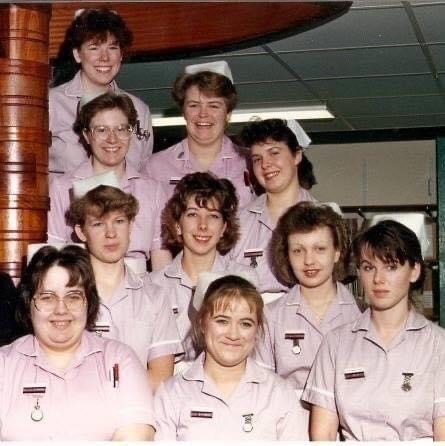 Group of nurses in pink uniform